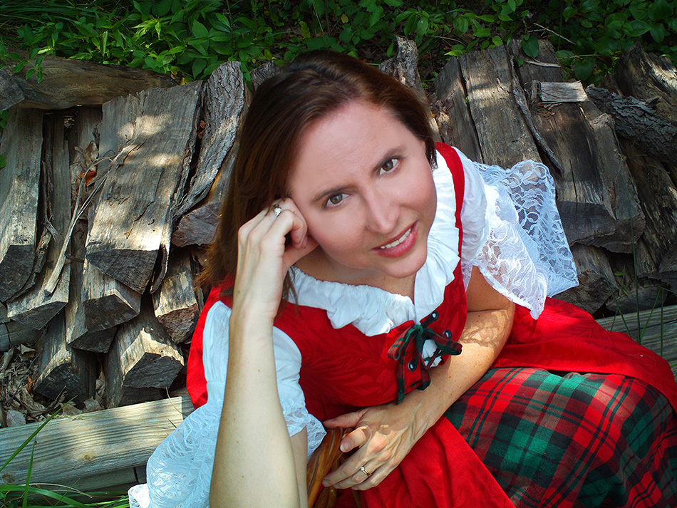 Author Jennifer Hudson Taylor in red Celtic gown
